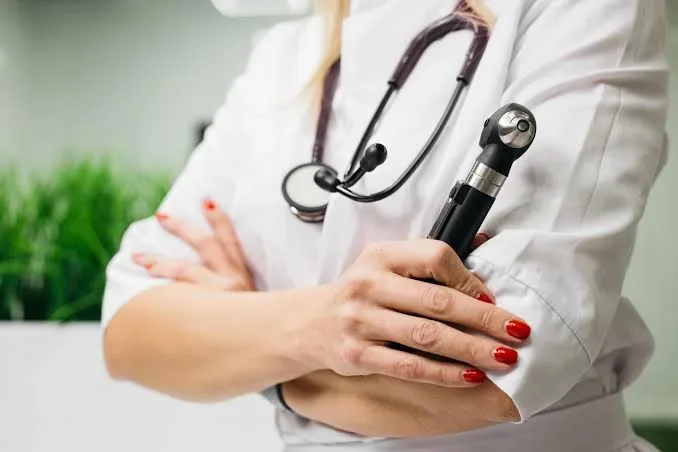 Doctor reviewing medical scan data on tablet computer